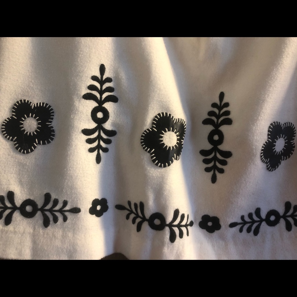 Ivory skirt black floral trim